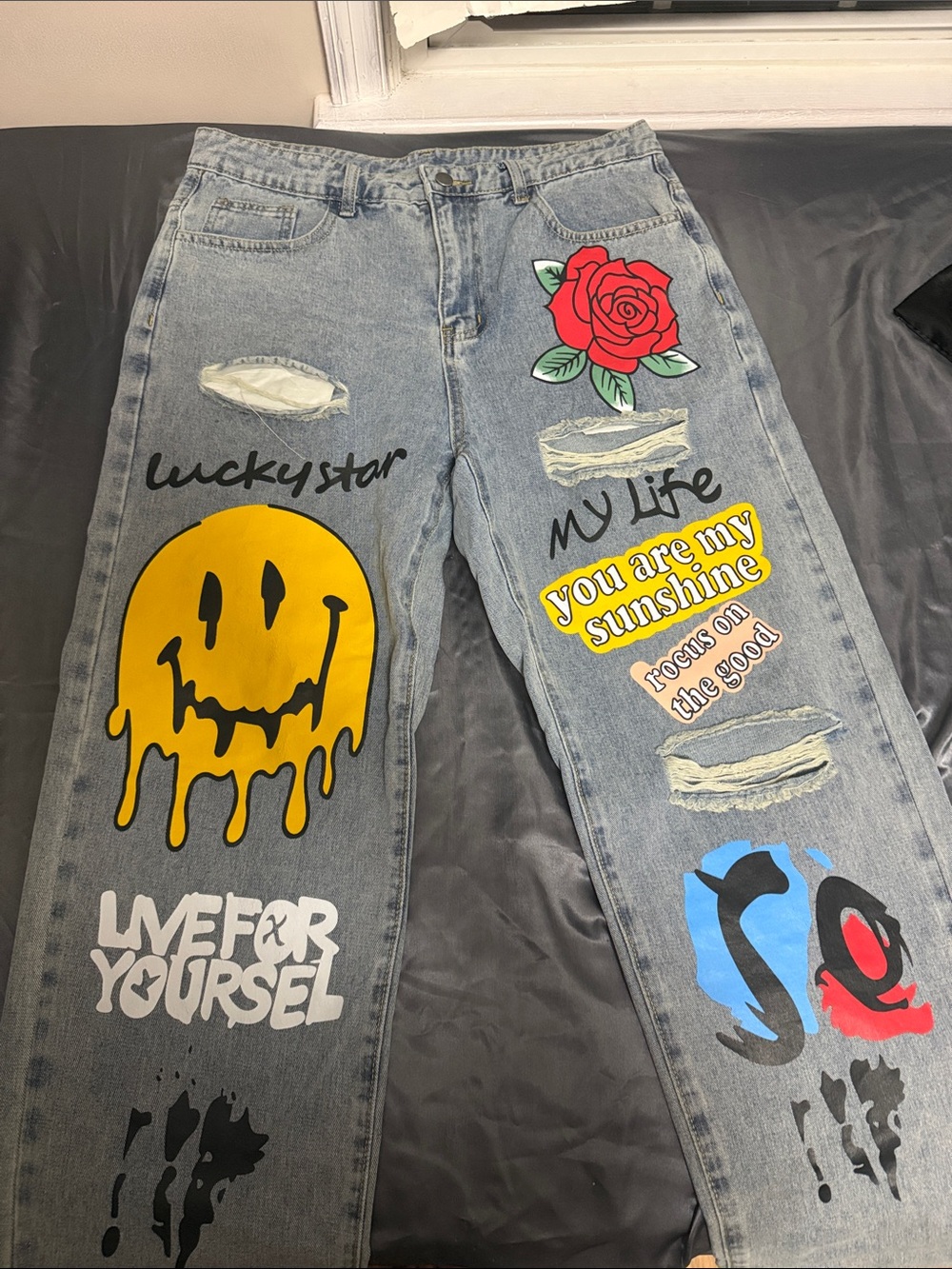 Graphic Light Wash Straight Men’s Jeans with Yellow Drip Smile & Red Rose